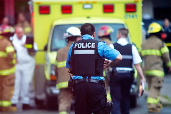 Police officer in blue shirt
