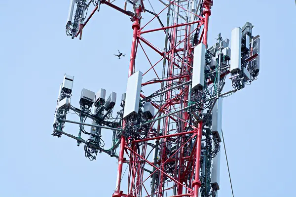 Red metal cell phone tower structure