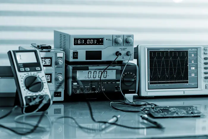 Multimeter on left side prominently shown