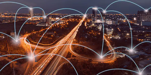 Glowing highway interchange with many roads