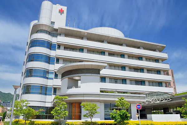 Large white hospital building exterior