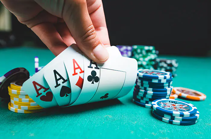 Fanned poker cards in hand
