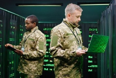 Soldiers in camouflage uniforms standing