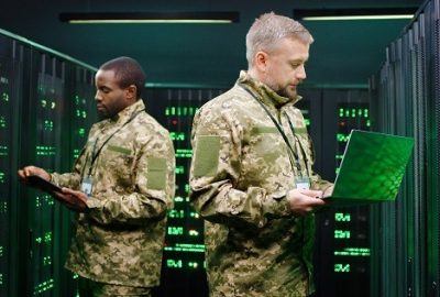 Soldiers in camouflage uniforms standing